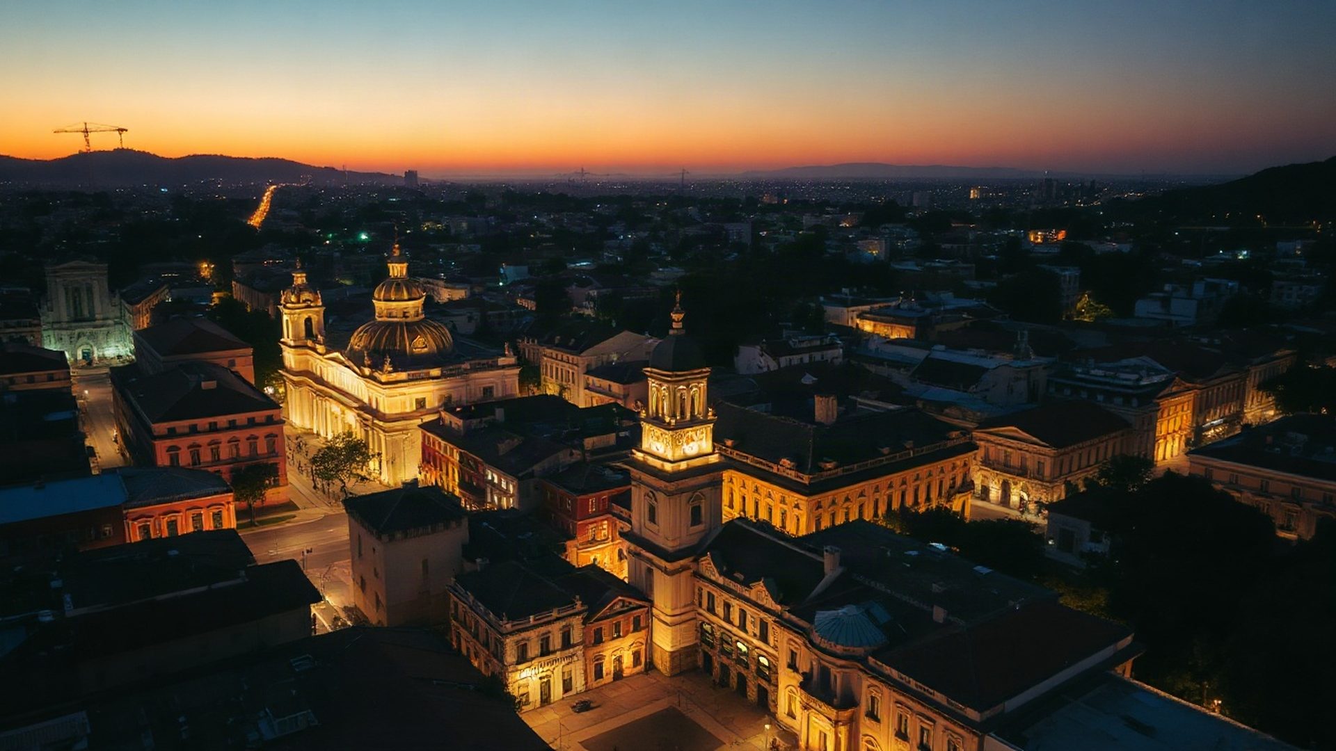 Vista aérea editorial de San Miguel de Tucumán al atardecer